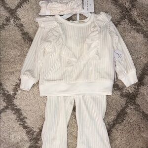Charming White Baby Outfit with Ruffles